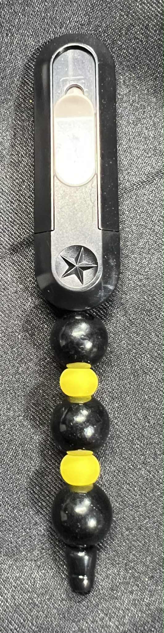 Beaded Slider to open Box Cutter